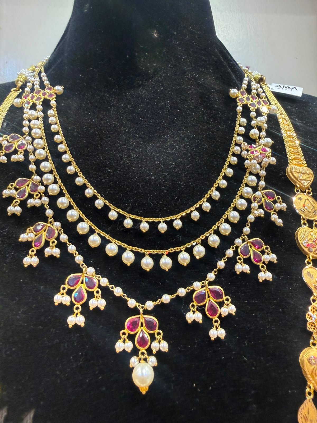 Layered pearl and ruby bridal necklace set at Aina Gold