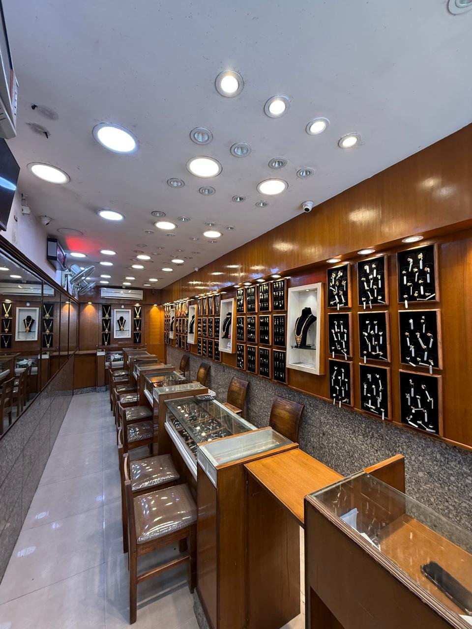 The jewellery counter and wall displays inside the Aina Gold showroom