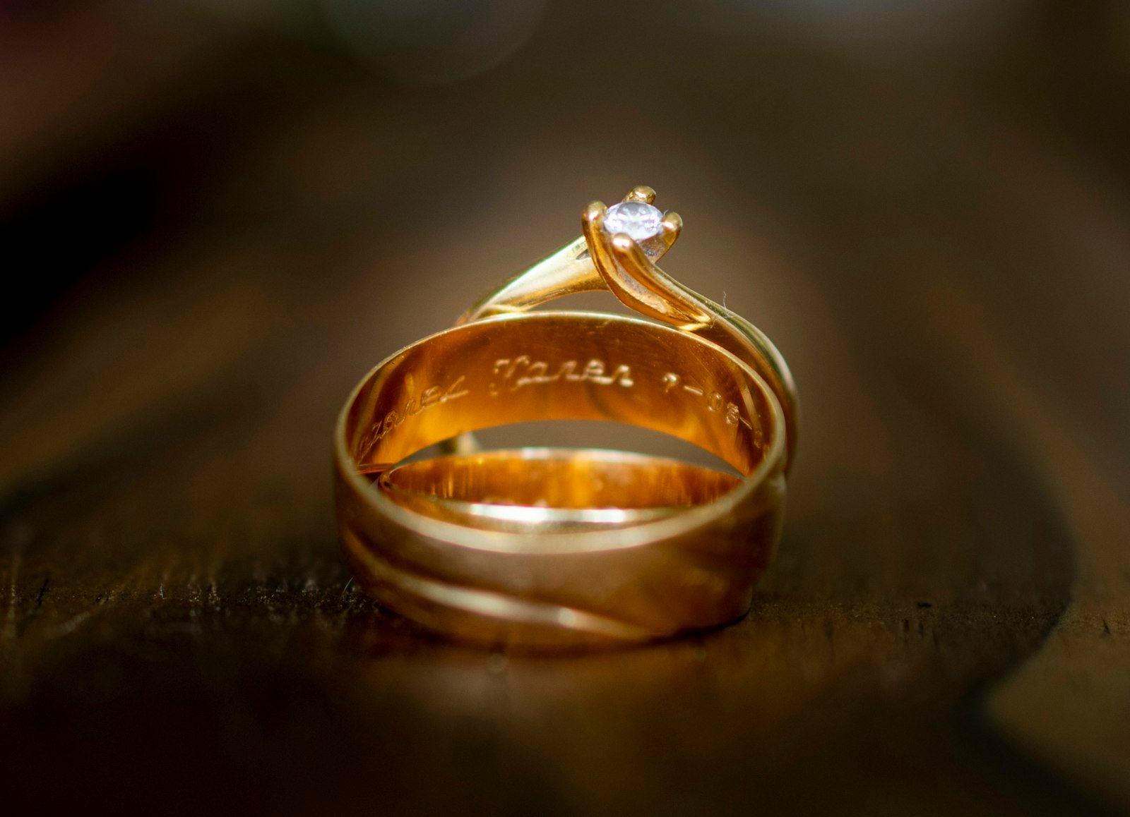 A pair of engraved gold rings — stock photograph, not a piece from Aina Gold's own case